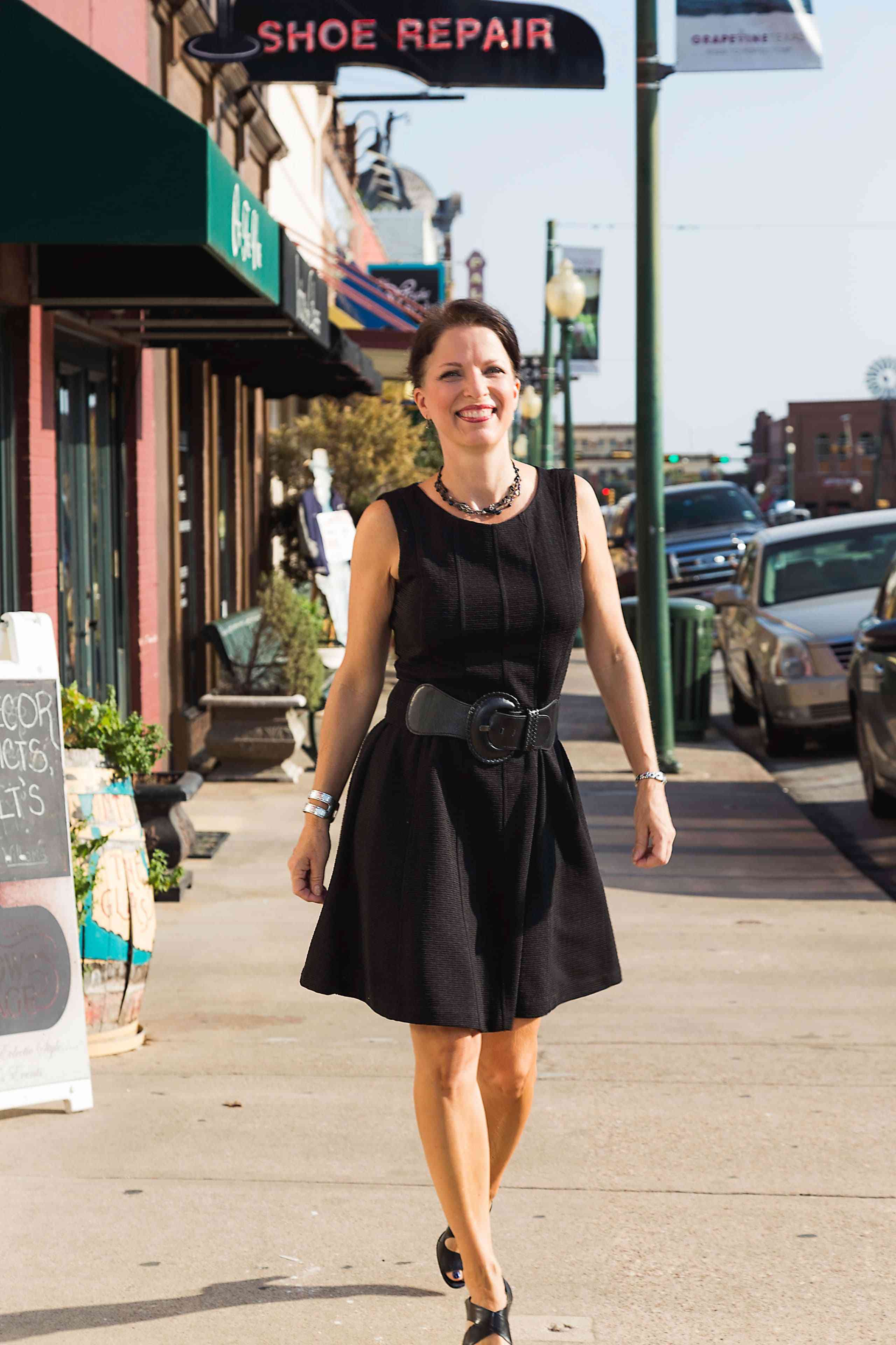 Janet St. James, breast cancer survivor walking on the street in Dallas