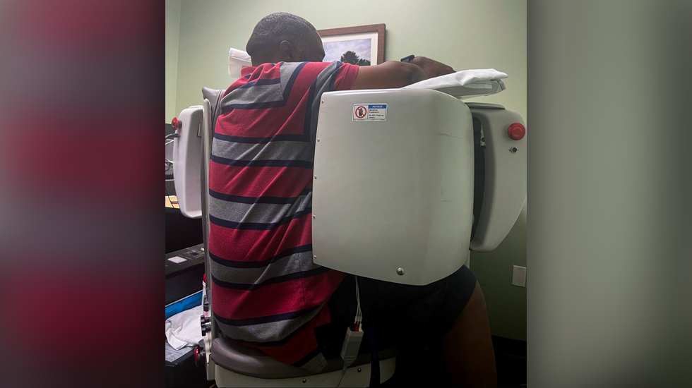 Photo of Jonathan receiving a medical test in the hospital
