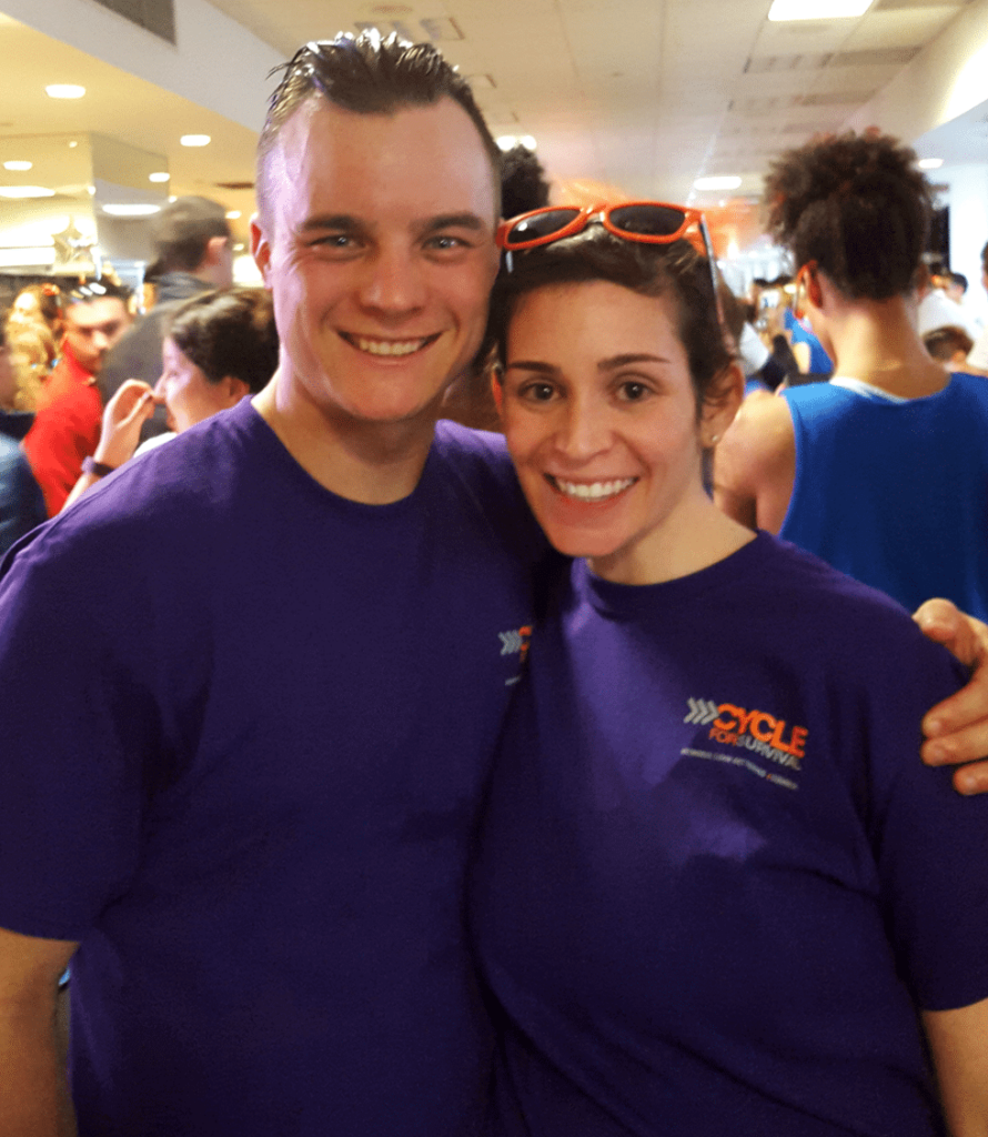 Rachel with friend at a cycle for survival event